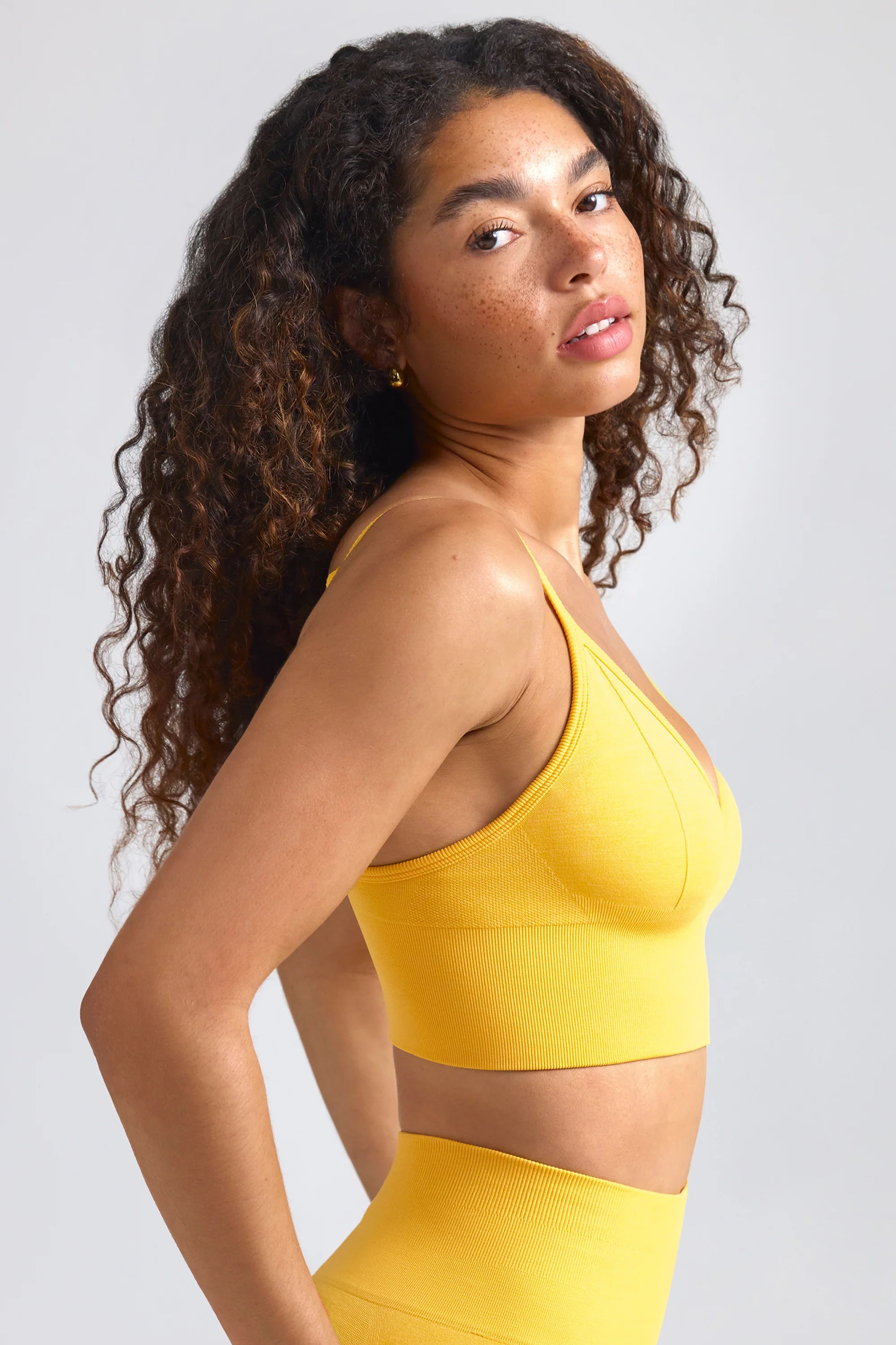 Define Luxe V-Neck Sports Bra in Golden Yellow - Image 2