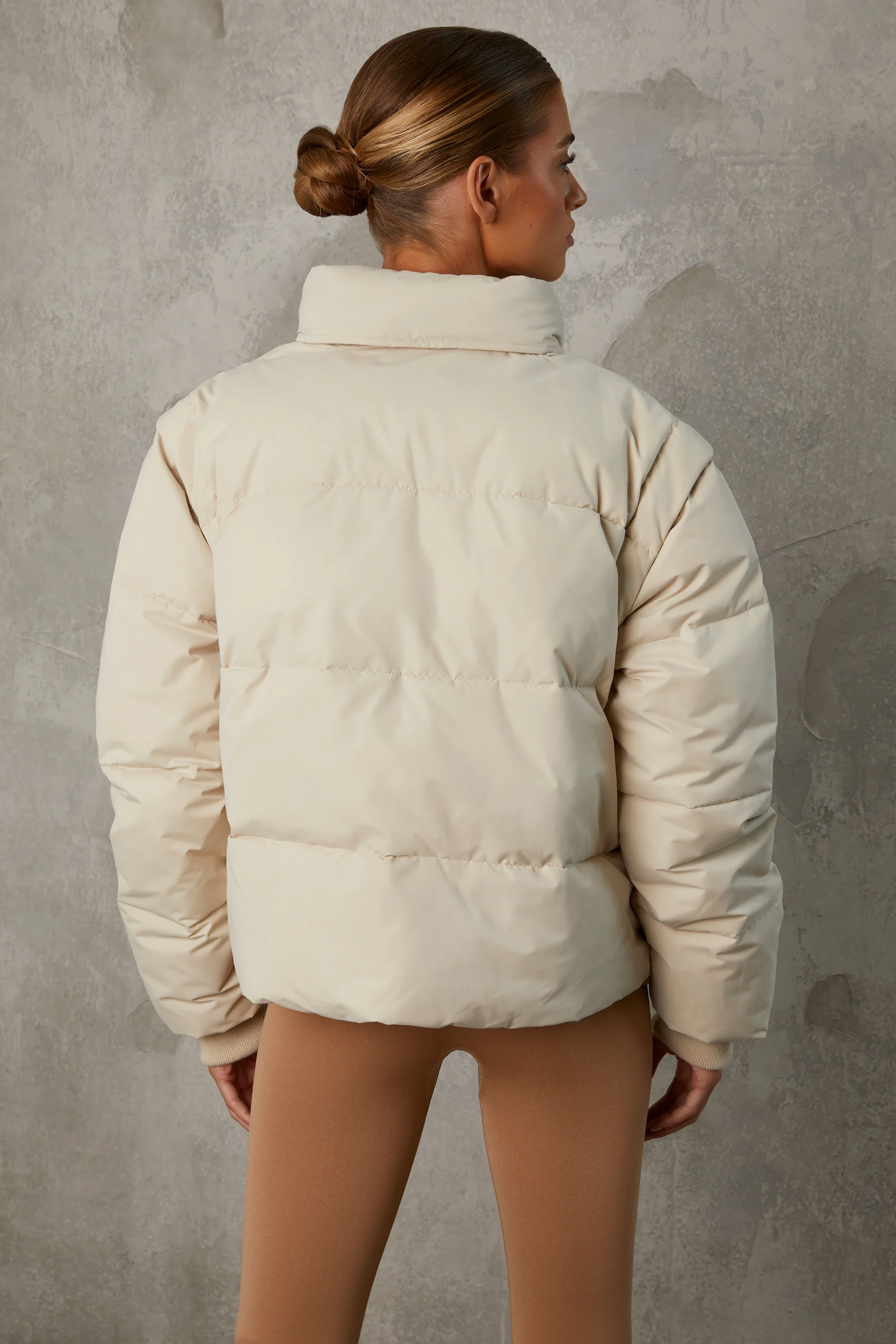 Cropped Puffer Jacket with Detachable Sleeves in Sand - Image 10